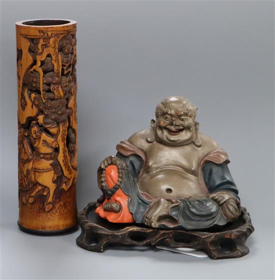 A Chinese bamboo perfume holder and a Chinese lacquer figure of Budai